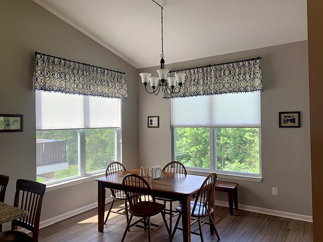 Shaped valances above a dining room window and door